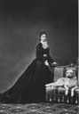 1867 Sisi wearing crinoline skirt and lace bow tie