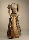 1890s Maria Feodorovna's visiting dress of silk, velvet, chiffon, lace, aiguillettes of metal, ribbon by Worth (Hermitage)