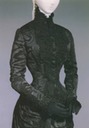 Detail of a dark hourglass figure dress worn by Empress Elisabeth (location unknown to gogm)