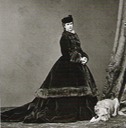ca. 1865 Elisabeth dressed for the cold in a fur-trimmed paletot by Emil Rabending
