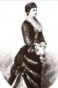 Elisabeth wearing a dress between the bustle periods