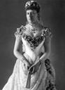 1885 Princess Beatrice posing in her wedding dress