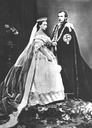 1863 Alice and Louis in garter robes at Prince of Wales' wedding