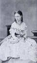 Princess Alice wearing a dress with abundant lace