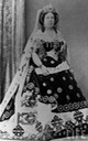 Isabel II in court dress, train, and veil