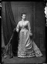 1875 Princess Alice standing wearing a bustle by Alexander Bassano