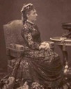 Maria Hendrika seated in lace dress