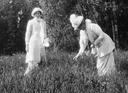 Tatiana and Alexandra picking flowers (Romanov Collection, General Collection, Beinecke Rare Book and Manuscript Library, Yale University - New Haven, Connecticut USA)